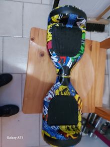 Multi Coloured Hoverboard in excellent cosmetic condition, no charger so can't test