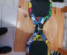Multi Coloured Hoverboard in excellent cosmetic condition, no charger so can't test