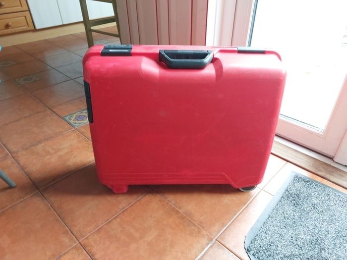 Red hard-shell suitcase