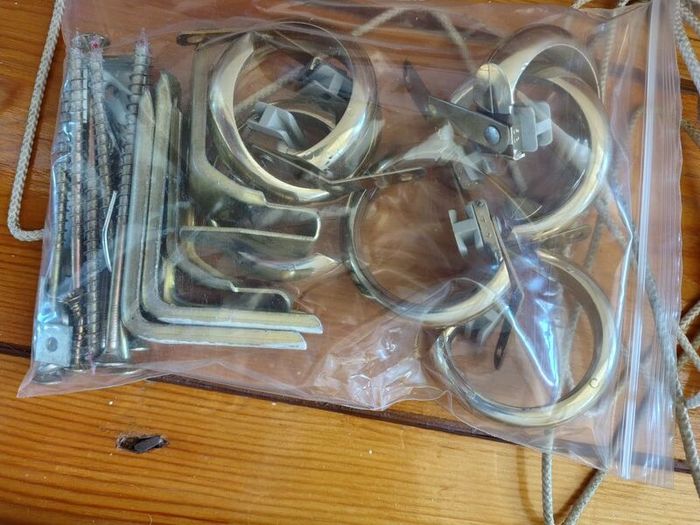 Brass coloured curtain track