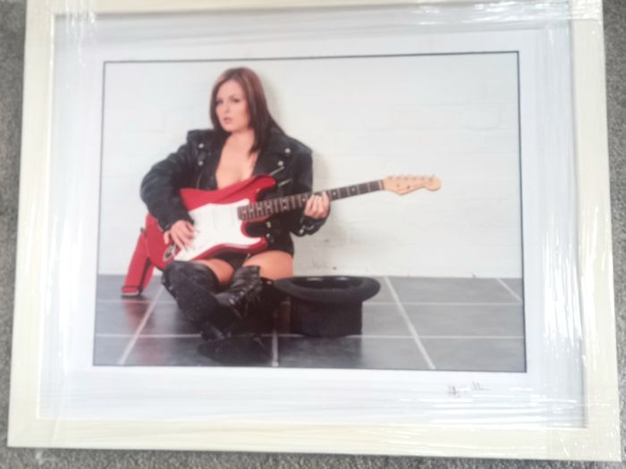 Framed photo of Busker on the underground