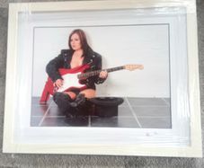 Framed photo of Busker on the underground