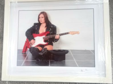 Framed photo of Busker on the underground