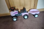 Pink tractor and trailer