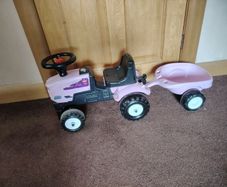 Pink tractor and trailer