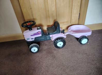 Pink tractor and trailer