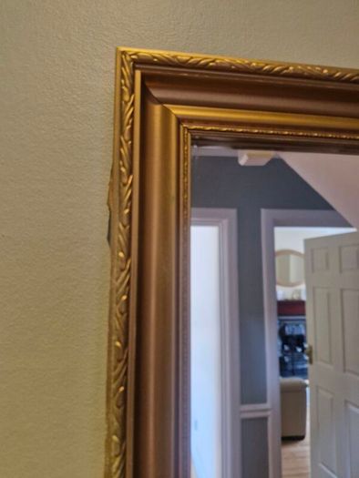 large glass gold mirror