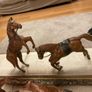 Pair of Antique leather horses Image 3