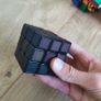 Collection of various puzzle cubes Image 3
