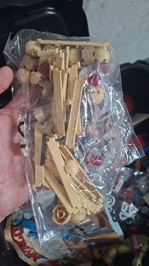 Large box of lego , accessories and weapons