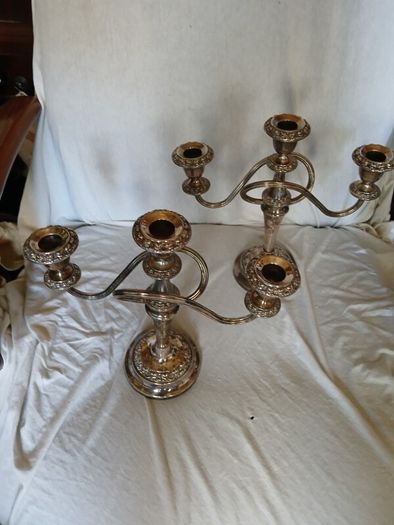a matching pair of traditional three light candlelabras silver plated