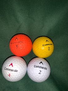 Commando golf balls (4)