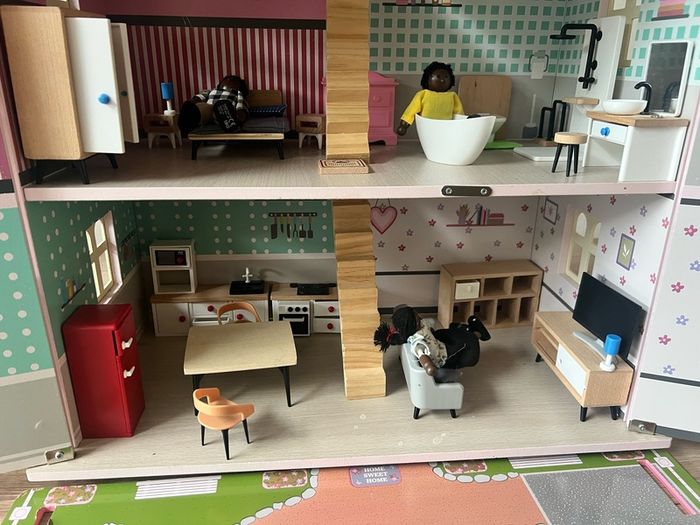 wooden dolls house with furniture & figures