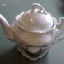 Old souvenir teapot with scene of Custom House Dublin. Image 3