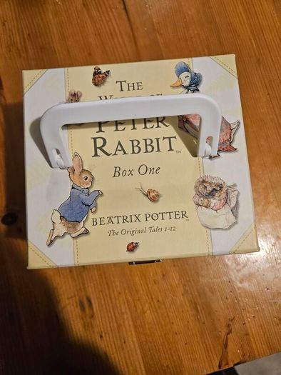 The World Of Peter Rabbit Box One By Beatrix Potter. 12 beautifully illustrated books in Beautiful Illustrated Carring Case. All In Very Good Condition.  See Photos For Same.