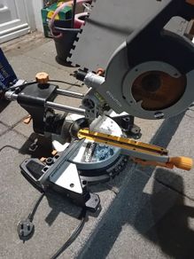 Evolution sliding mitre saw