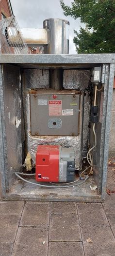 Firebird external oil boiler with housing.