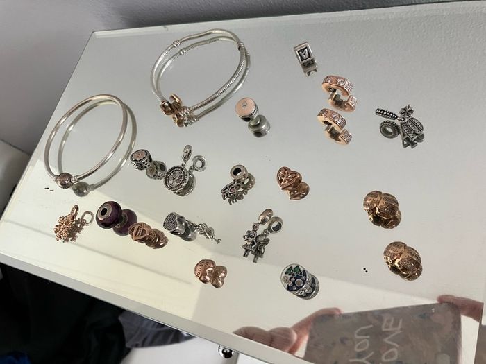 Assorted pandora charms and bracelets