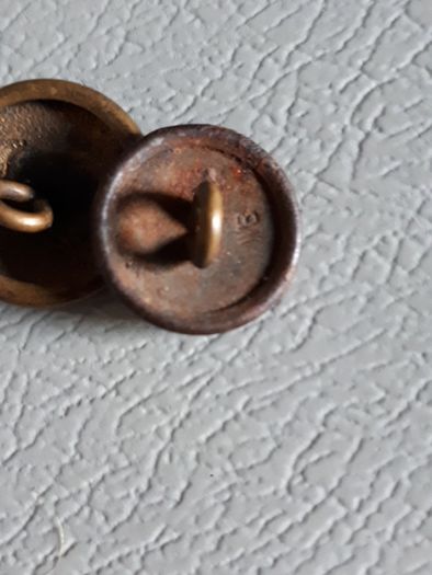 military buttons.