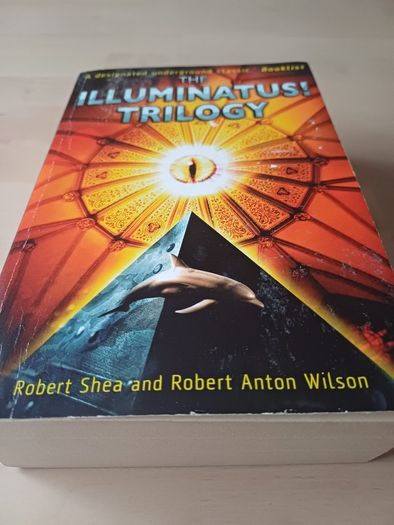The Illuminatus Trilogy by Robert Anton Wilson (Science Fiction Conspiracy Paperback 1998)