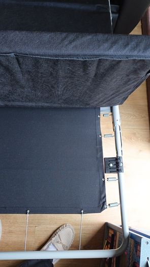 Black leather two-seater sofa-bed