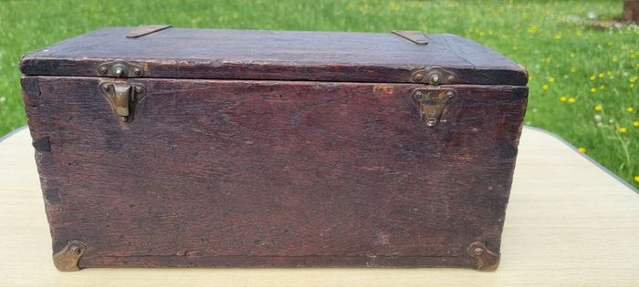 Old wooden box with brass fittings