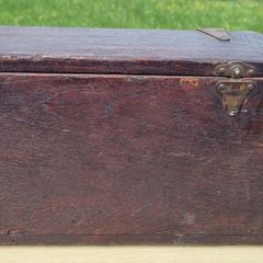 Old wooden box with brass fittings