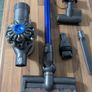 Dyson V6 handheld vacuum cleaner with charger and accessories Image 3