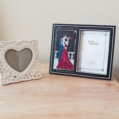 Two freestanding glazed photo frames;  white ceramic heart-shaped picture frame &  Art Deco style dual picture frame