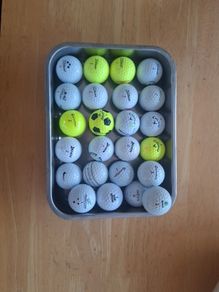 24 Golf balls