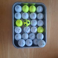 24 Golf balls
