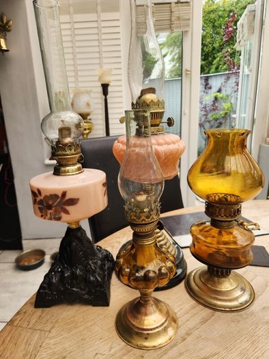 four vintage working oil lamps