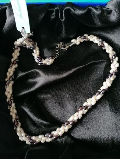 Freshwater pearl necklace and bracelet for sale. New, in original boxes.