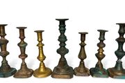 7 antique brass candle holders
