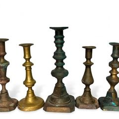 7 antique brass candle holders