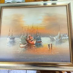 Framed Oil Painting on canvas of sailboats at sunset signed..