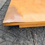 Solid wood dining table. Damage on corner as shown in photos. Image 3