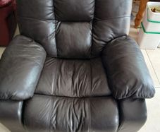 Armchair.  Manual Recliner.  Dark brown.   Very good condition. Recliner works perfectly.