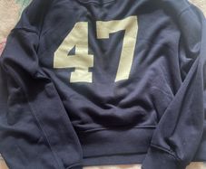 Navy sports jumper with number
