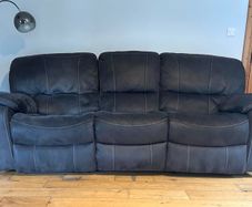 Sofa- grey in colour