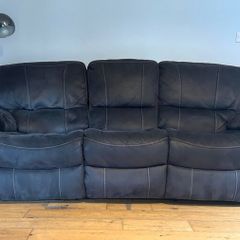 Sofa- grey in colour
