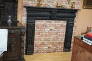 Ram-Head Wrought Iron Fireplace Surround with Timber Mantel