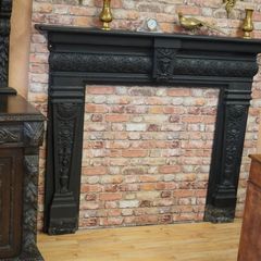 Ram-Head Wrought Iron Fireplace Surround with Timber Mantel