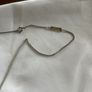 Authentic Yves Saint Laurent chain with logo pendant Image 3