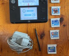 Nintendo 2DS with games and charger