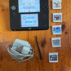 Nintendo 2DS with games and charger