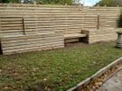 Custom timber garden fencing with integrated planters and bench Image 2