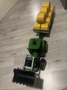 John Deere tractor and bale trailer
