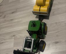 John Deere tractor and bale trailer