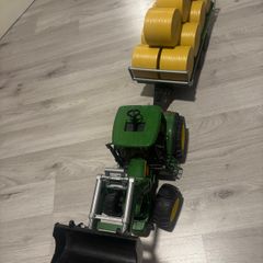 John Deere tractor and bale trailer